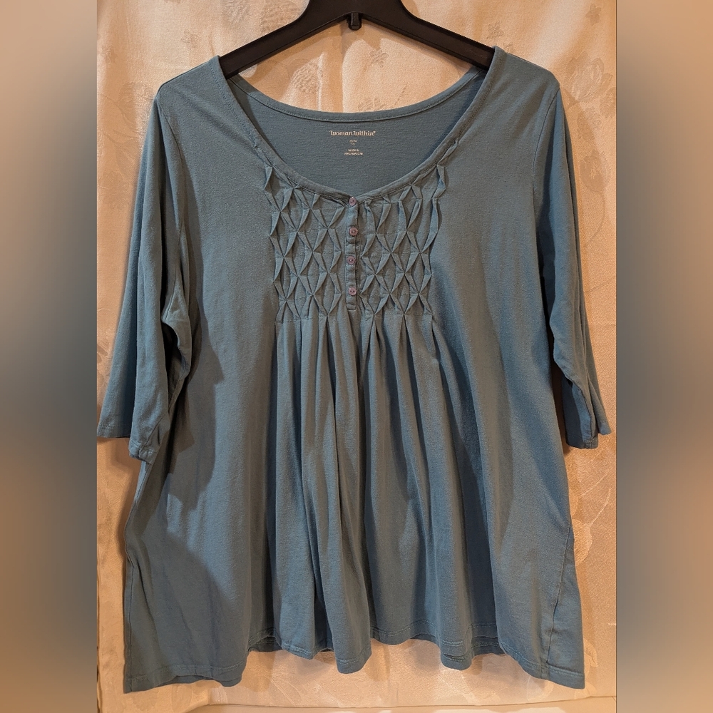 Woman Within Teal Tunic with Button Detail